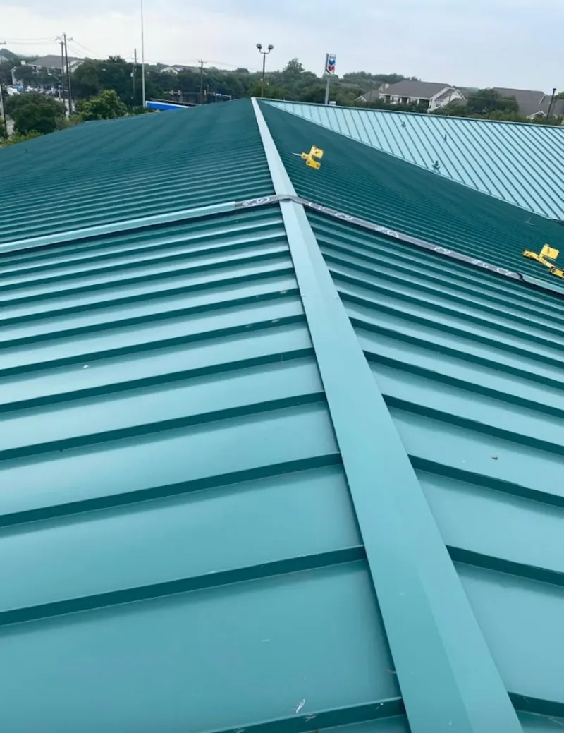 Green commercial metal roof ridge and valley for Metal Roof Repair in Dalhart