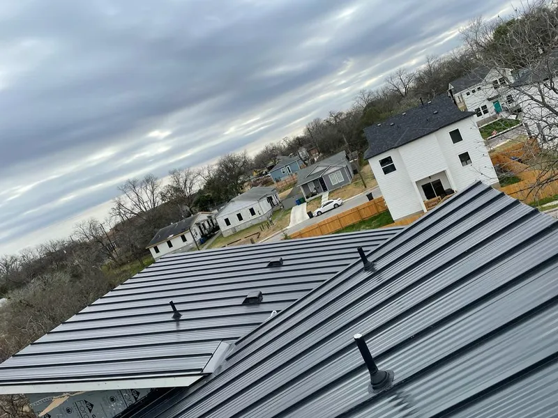 Standing seam metal roof panels with vents for Skylight Repair in Dalhart